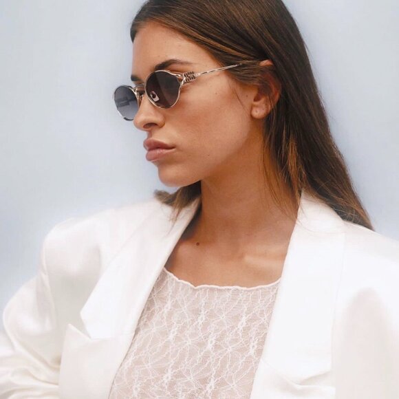 Miu Miu MU52YS ZVN5D1 Sunglasses Pale Gold Oval Frame, Grey Gradient Lenses main image 11
